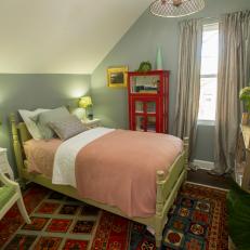 Green Cottage-Styled Guest Bedroom with Patterned Area Rug