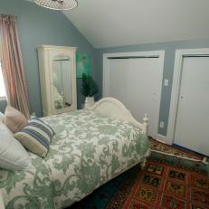 Contemporary Green Bedroom with Multicolored Patterned Rug