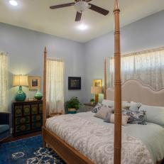 Contemporary Blue Master Bedroom with Hardwood Brown Floors