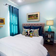 Contemporary Blue Guest Bedroom with Tuft-Upholstered Headboard