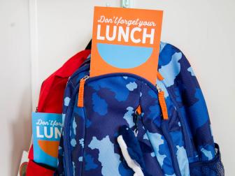 Place a brightly colored card in each backpack the night before, so forgetting lunch will be practically impossible.