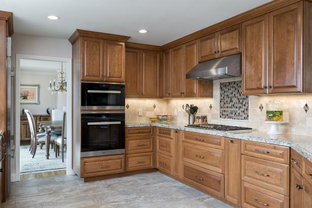 Kitchen With Dual Ovens And Ceiling Height Wood Cabinets Hgtv