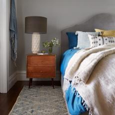 Bedroom With Gray Walls and Midcentury Modern Nightstand