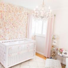 Feminine Pink Nursery With Wall of Silk Flowers