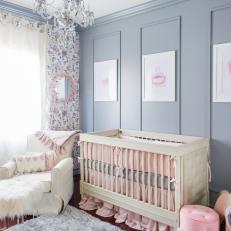 Gray and Pink Nursery With White Crib and Furry Stool