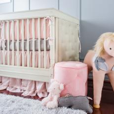 White Crib and Pink Unicorn in Gray Nursery
