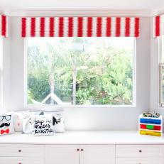Red-and-White Striped Cornice Over White Window Seat