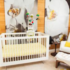 Nursery With White Crib, Orchid Mural and White Rocker