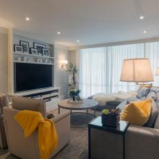 Yellow Throws and Pillows Add Color to the Neutral Living Room Design