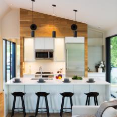 Modern Kitchen Area With Large White Eat-In Island