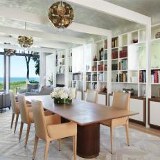 Contemporary Dining and Living Room With Bookshelves