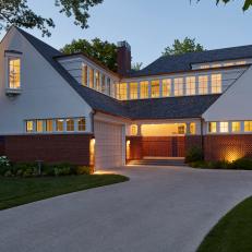 White Exterior at Night and Driveway