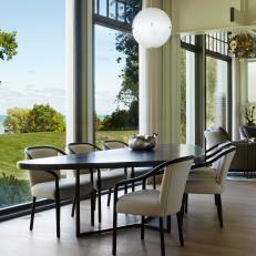 Contemporary Dining Room With Window Walls