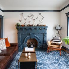 Eclectic Living Room With Striking Blue Fireplace