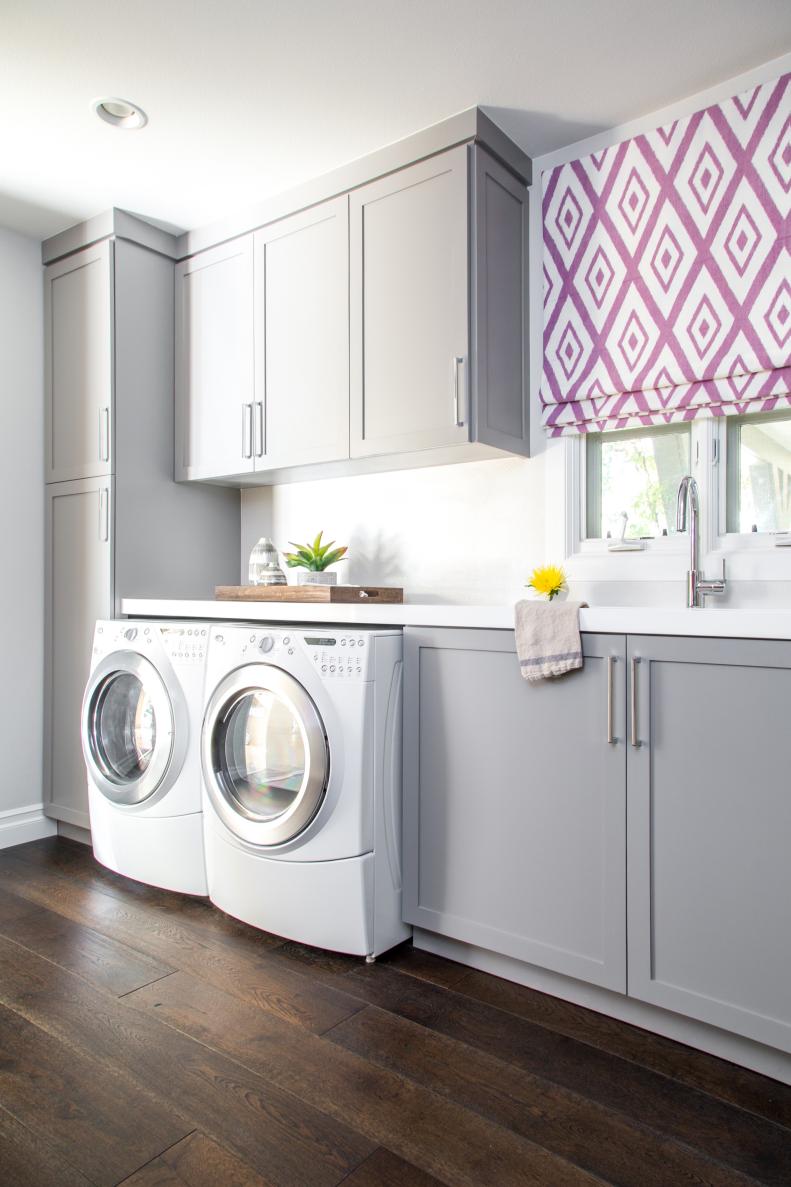 Contemporary Laundry Room With Storage Space