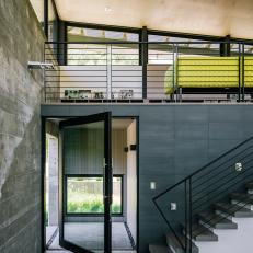 Modern Stairwell and Sleeping Loft with Natural Finishes