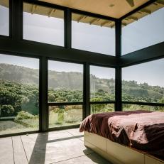 Modern Bedroom with Glass Exterior Walls