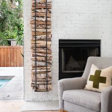 White Brick Fireplace and Stacked Wood