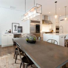 White Open Plan Kitchen and Dining Table
