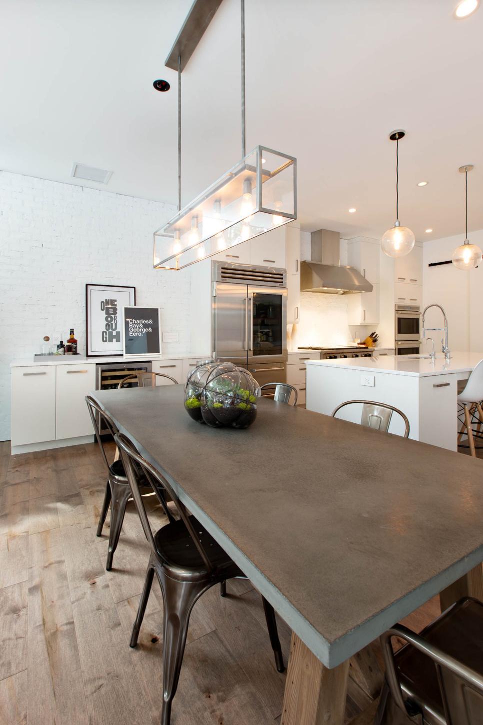 White Open Plan Kitchen and Dining Table | HGTV