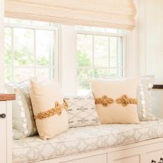 Built-In Window  Seat With Sage, White, and Cream Cushions