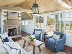 Seaside Country Living Room With Blue Chairs & Exposed Beams