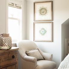 White Bedroom Reading Nook With Armchair and Weathered Chest
