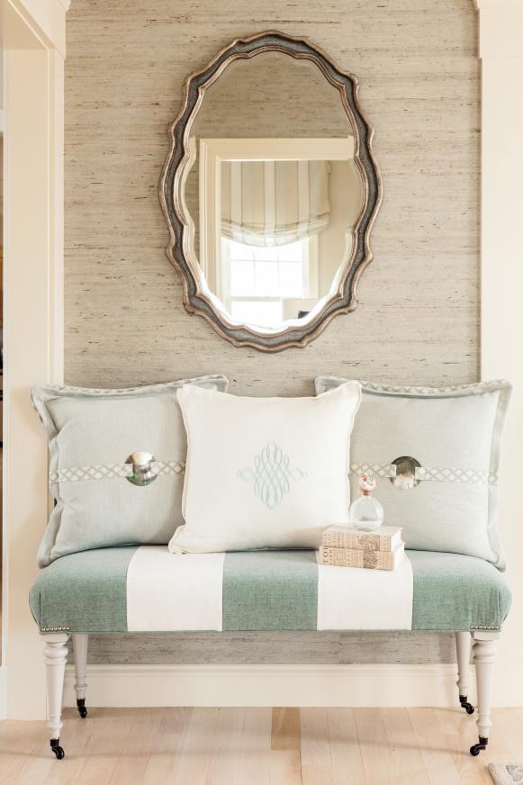 Cottage Sitting Area With Striped Bench and Arabesque Mirror