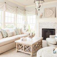 Guest Cottage Neutral Living Room With White Brick Fireplace