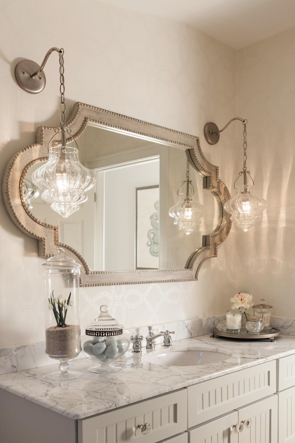 Cape Cod Neutral Bathroom With Swag Lights & Nailhead Mirror | HGTV