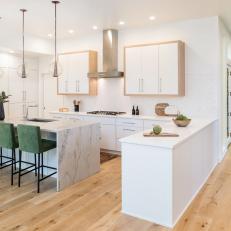 Peninsula Adds Definition to Kitchen and Hallway Spaces