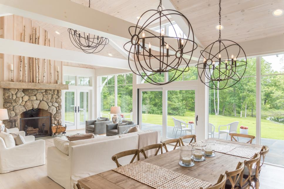 Cottage Dining Area With Globe Chandeliers