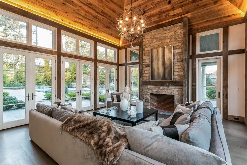 Family Room With Reclaimed Barnwood Ceiling and Stone-Veneer Fireplace