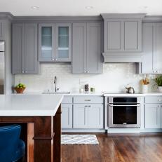 Blue Velvet Barstools Add Color and Seating to Gray Kitchen