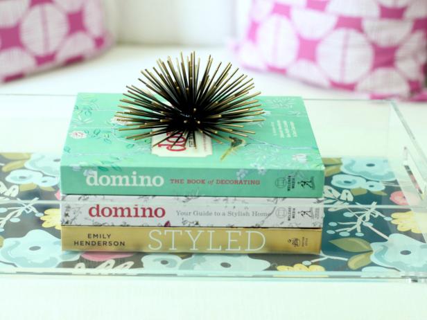 Acrylic Serving Tray Styled with Brass Urchin and Books