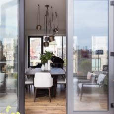 Glass Double Doors Extend Home's Entertaining Space