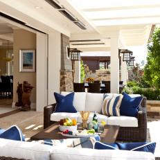 Wicker Sofas With Blue Pillows on Patio