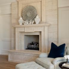 Fireplace and Beige Linen Armchair