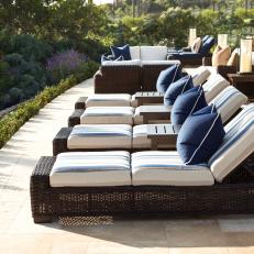 Patio With Blue Striped Lounge Chairs