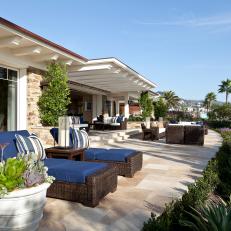 Patio With Blue Lounge Chairs