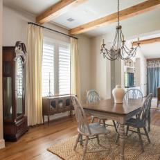 Country Dining Room With Natural Fiber Rug