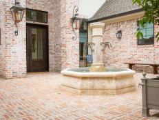 French Country Courtyard With Fountain