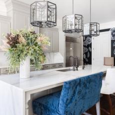 Midcentury Modern Kitchen Featuring Octagon Pendant Lights and Blue Velvet Accent Bar Chair