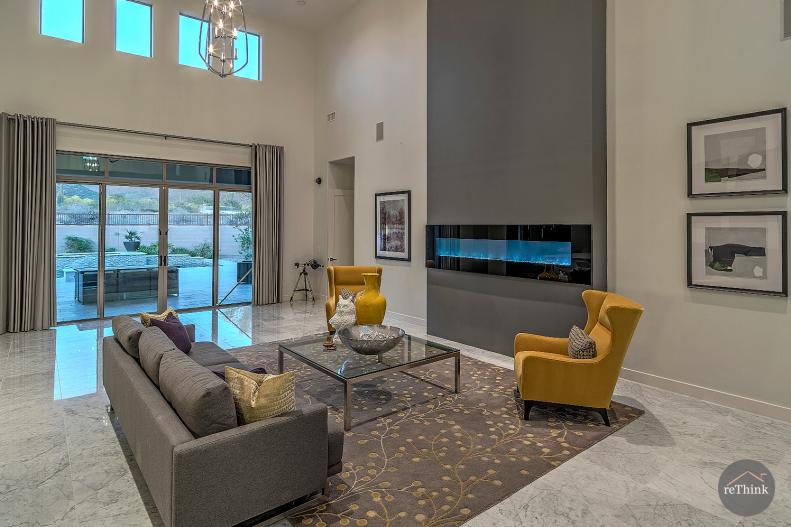 Gray Sofa and Yellow Armchairs in Neutral Contemporary Living Room