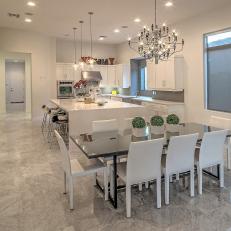 White Contemporary Eat-In Kitchen With Chandelier