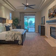Neutral Southwestern Bedroom With Fireplace