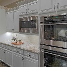 Cabinets and Stainless Steel Kitchen Appliances