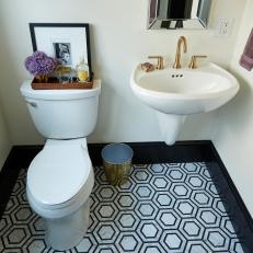 Contemporary White Bathroom with Black and White Tile Floor