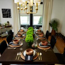 Brown and White Modern Dining Room with Gold Light Fixture