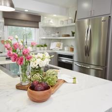 Modern White Kitchen with White Marble-Topped Island